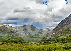 Valley and mountains in the subpolar urals on a summer day