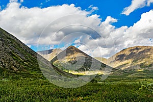 Valley and mountains in the subpolar urals on a summer day photo