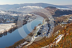 The valley of river Moselle in winter with snow