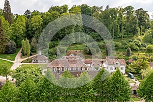 At the valley of Staatspark Furstenlager, Germany surrounded by lush, green trees photo