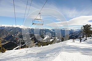 VallNord, ski lift chair El Cubil, sector Pal, the Principality of Andorra, the eastern Pyrenees, Europe. photo