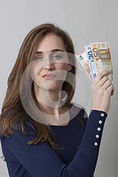 Value for money concept for proud Euro 20s woman