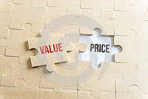 Value and Price on a puzzle pieces.