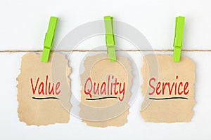 Value Quality Service written on old paper