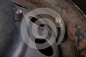 The valve in the car wheel. Replacement and service of tires in a passenger car