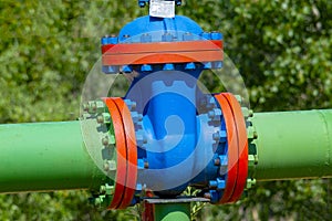A valve on a pipe for pumping oil at a field in Siberia.