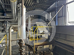 Valves and other safety equipment on an old steam boiler. Extensive wear, corrosion and contamination of the equipment and the