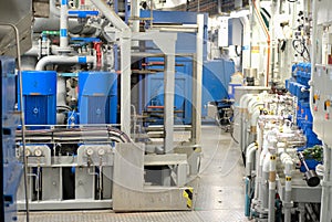 Valves and Pumps inside Engine Machinery Room on modern Ship