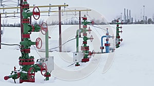 The valves at the wellhead production. In the