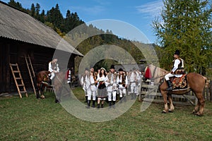 Vama, Romania, September 28th, 2019, People wearing traditional play a wedding look like in Bucovina