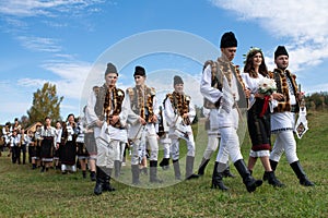 Vama, Romania, September 28th, 2019, People wearing traditional play a wedding look like in Bucovina