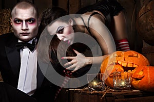 Vampires with halloween pumpkin