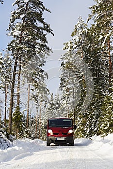 Van, 4x4, driving on a snowy country road