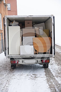 Van with boxes and furniture