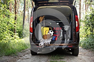 Van with camping equipment in trunk