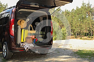 Van with camping equipment in trunk