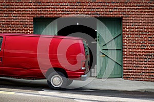 Van in Front of Warehouse Doors