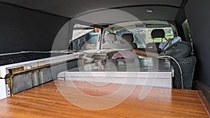 A van packed full of furniture and old appliances ready to be removed to the recycling center