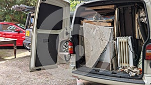 A van packed full of house clearance removals waste photo