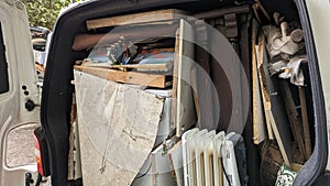 A van packed full of house removals clearance garbage photo