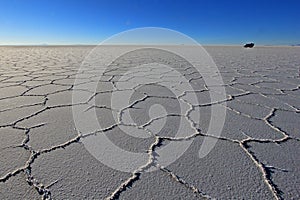 Van on Salar de Uyuni, salt lake, Bolivia