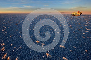 Van on Salar de Uyuni, salt lake, Bolivia