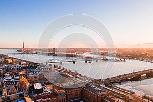 VanÃÂ¡u Bridge  on the Daugava river gleaming under the cloudy sky in Riga, Latvia photo