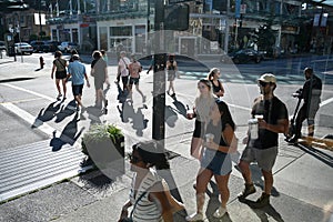 Vancouver, BC, Canada - August 15, 2023: People on the street in downtown of Vancouver