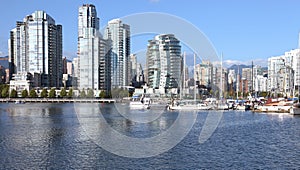 Vancouver BC south waterfront skyline & sailboats.