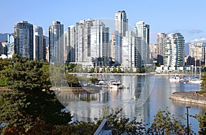 Vancouver BC south waterfront skyline & sailboats.