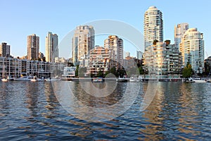 Vancouver BC south waterfront skyline & sailboats.