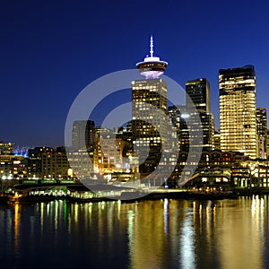 Vancouver British Columbia Canada City Skyline at Night Reflected in Water