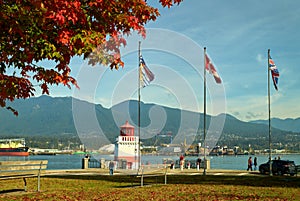 Vancouver, British Columbia, Canada Ã¢â¬â September 25, 2018 Stanley Park Autumn Flags and Lighthouse