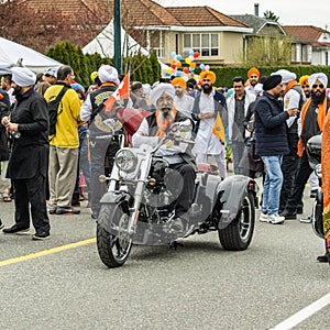 VANCOUVER, CANADA - April 14, 2018: people from sikh motorcycle club on the street during annual Indian Vaisakhi Parade