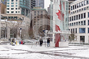 View of Canada Place Square covered with snow. Snow storm and extreme weather in Vancouver.