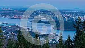 Vancouver city downtown panorama. Vancouver Harbour marina aerial view dusk to night.