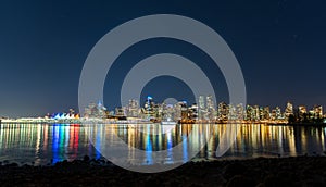 Vancouver downtown skyline night panorama. British Columbia, Canada.