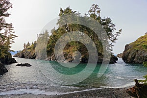 Vancouver Island, Sheltered Cove and Rocky Island at Cabin Point in East Sooke Regional Park, British Columbia, Canada