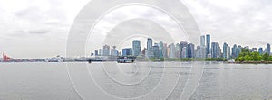 VANCOUVER - May 28, 2019: Panoramic view of downtown Vancouver harbour and skyline seen from Stanley Park in British Columbia,