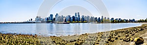 The Vancouver Skyline viewed from the walking and biking path on the Seawall in Stanley Park