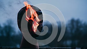 Vandal sets fire to the head of the dummy
