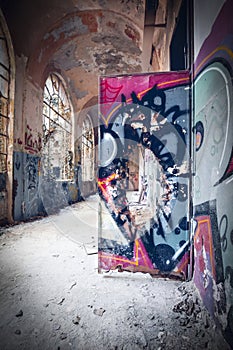 vandalised interior of an abandoned building