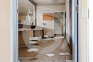 Vandalised office reception area of abandoned building