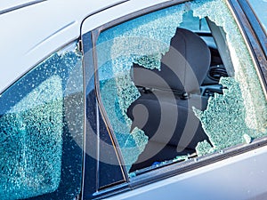 Vandalism car window broken glass