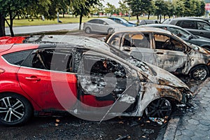 Vandalism or revenge, burnt car. The consequences of popular protest, burnt car, a crime. Car after fire. Auto trash