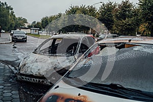 Vandalism or revenge, burnt car. The consequences of popular protest, burnt car, a crime. Car after fire. Auto trash