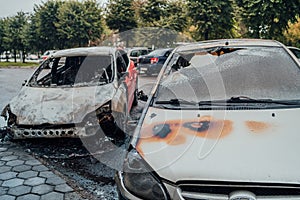 Vandalism or revenge, burnt car. The consequences of popular protest, burnt car, a crime. Car after fire. Auto trash