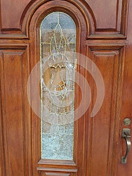 Vandalized church wood front door photo