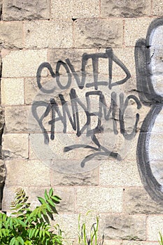 A vandalized stone wall