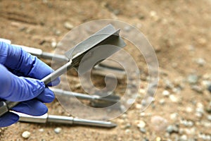 Vane test for soil share strenght testings. Soil sample collected from construction geology drilling works at site photo